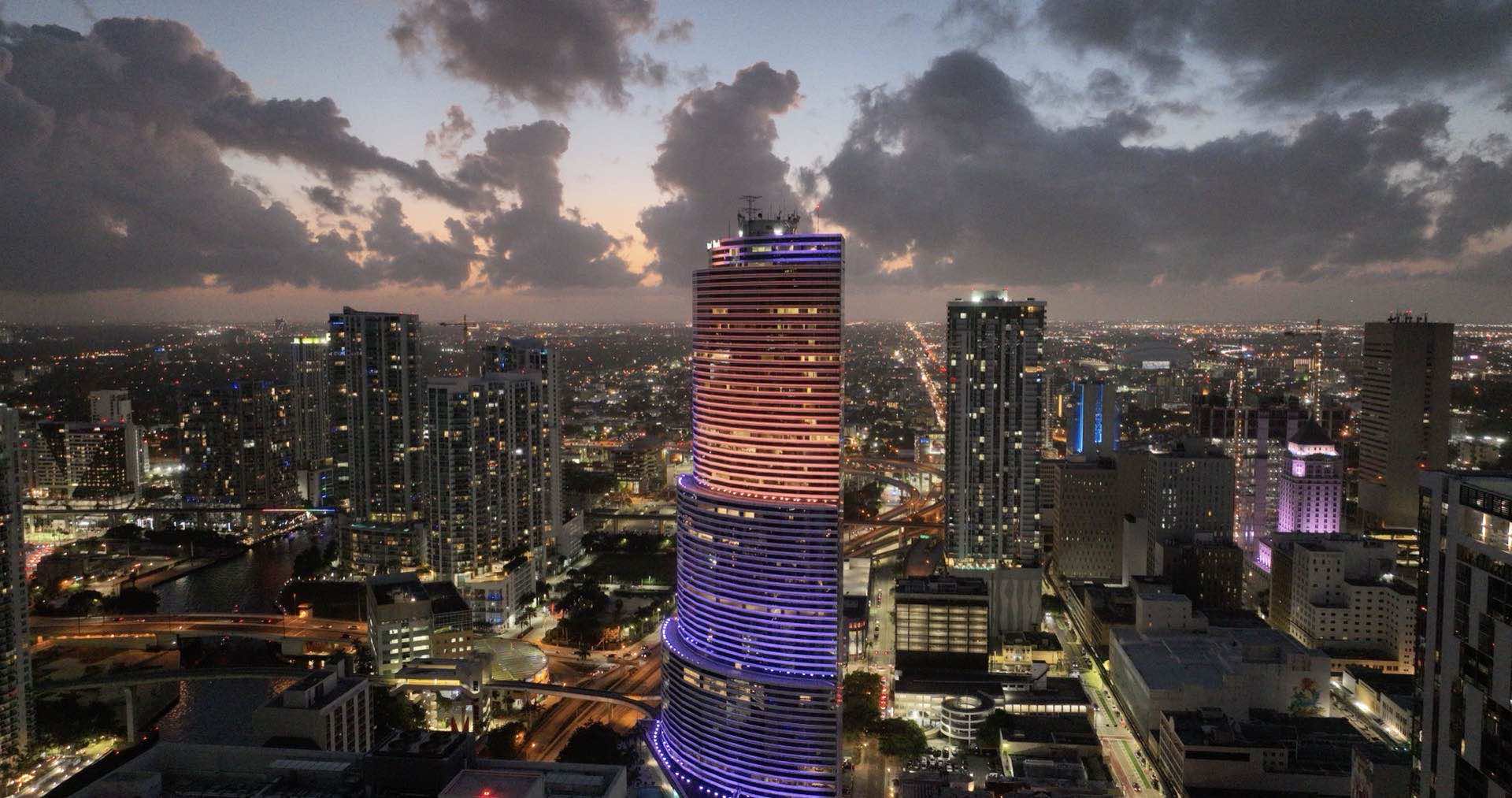 Nighttime drone aerial view of Miami high-rise buildings used for roof and facade inspection